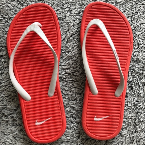 Nike Shoes - Nike - pink & white solarsoft flip flops! Nike Shoes - Nike - pink & white solarsoft flip flops!